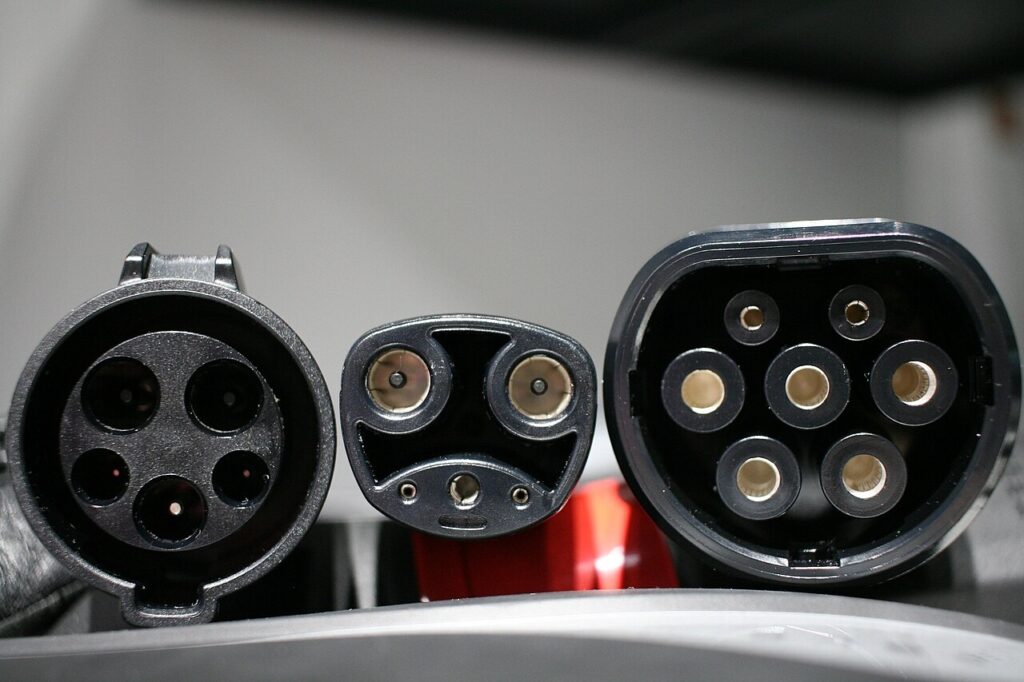 View of common EV charging station plug types