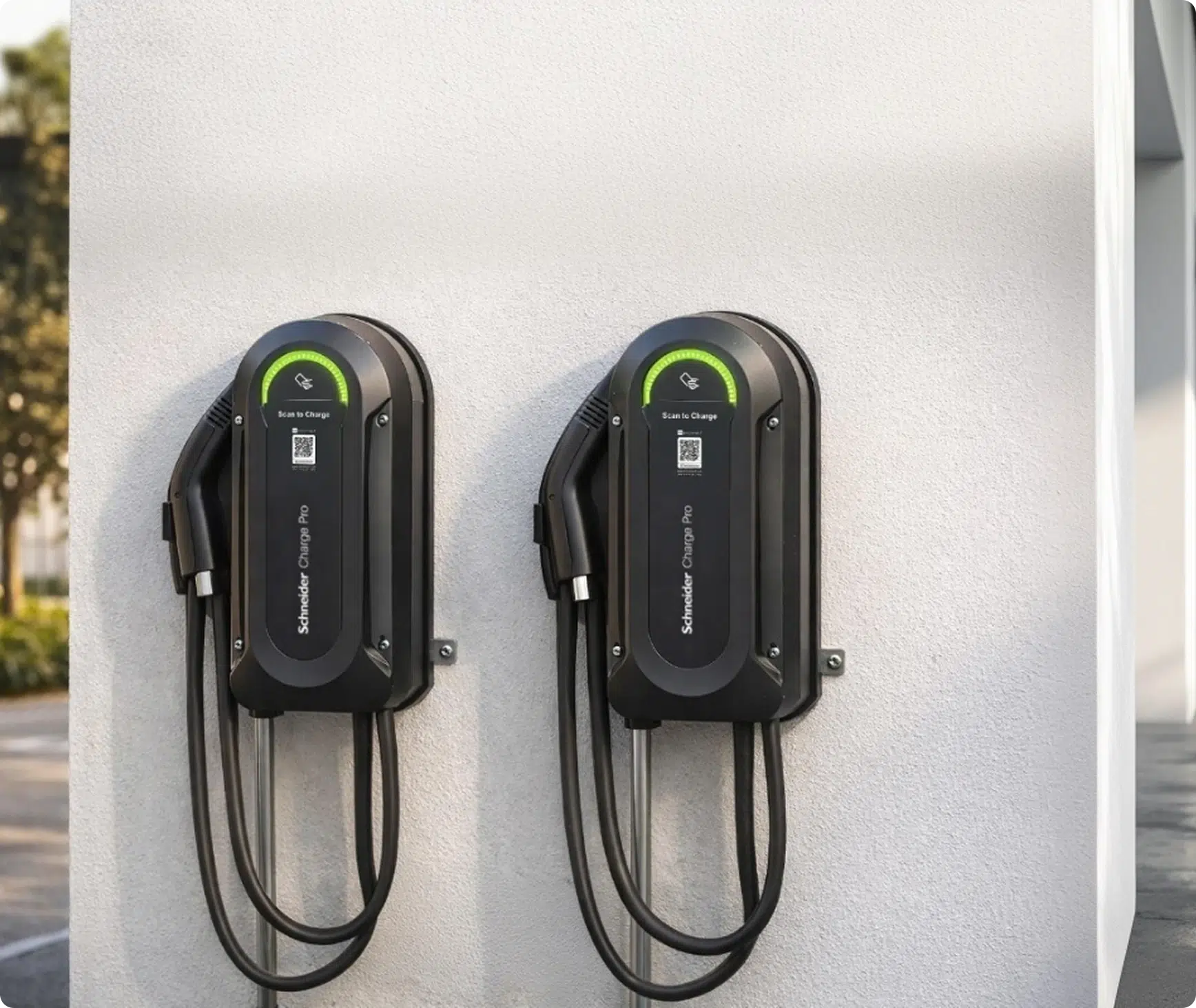 Two wall-mounted Schneider Charge Pro stations.